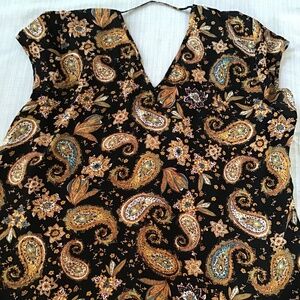 Women’s black top with paisley designs